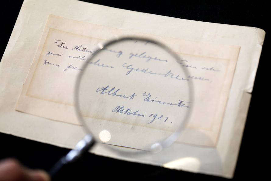 A note written by Albert Einstein to Italian chemistry student Elisabetta Piccini in Florence, Italy, in 1921 is seen before it is sold at an auction in Jerusalem
