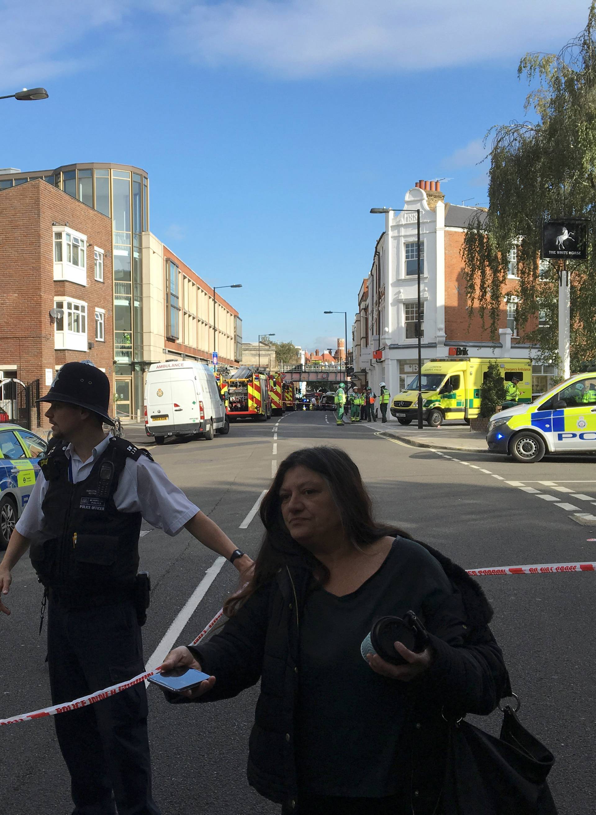 Police cordon off an area near Parsons Green station in London
