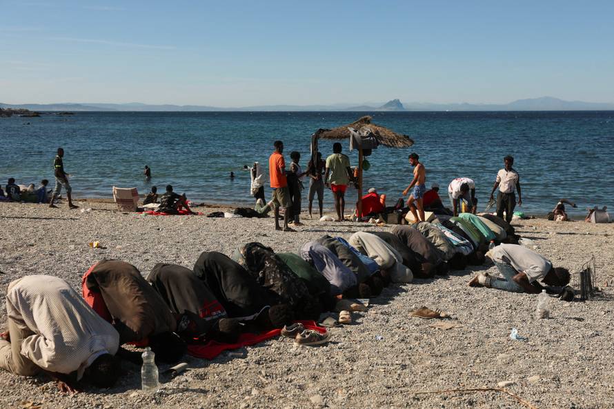 Mass crossings of migrants on foot and by sea from Morocco into Spanish territory, in Ceuta