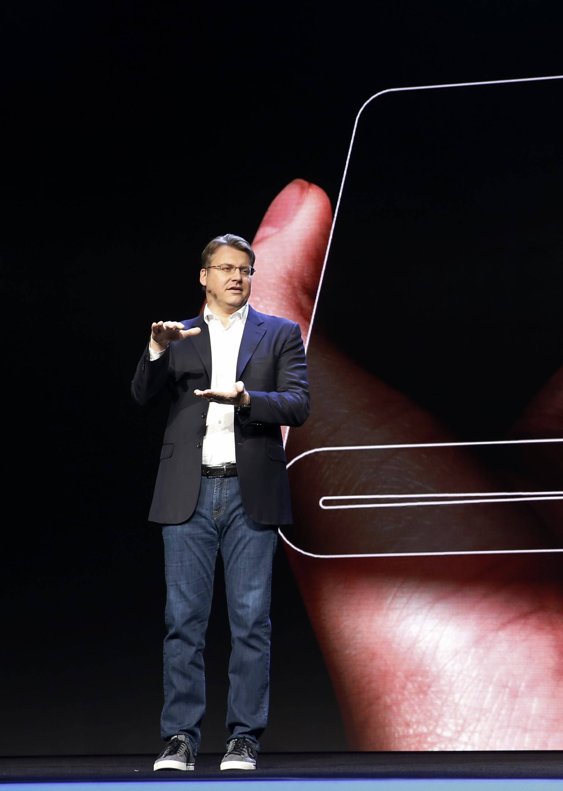 Justin Denison, Samsung Electronics senior vice president of Mobile Product Marketing, speaks during the unveiling of Samsung's new foldable screen smart phone, during the Samsung Developers Conference in San Francisco