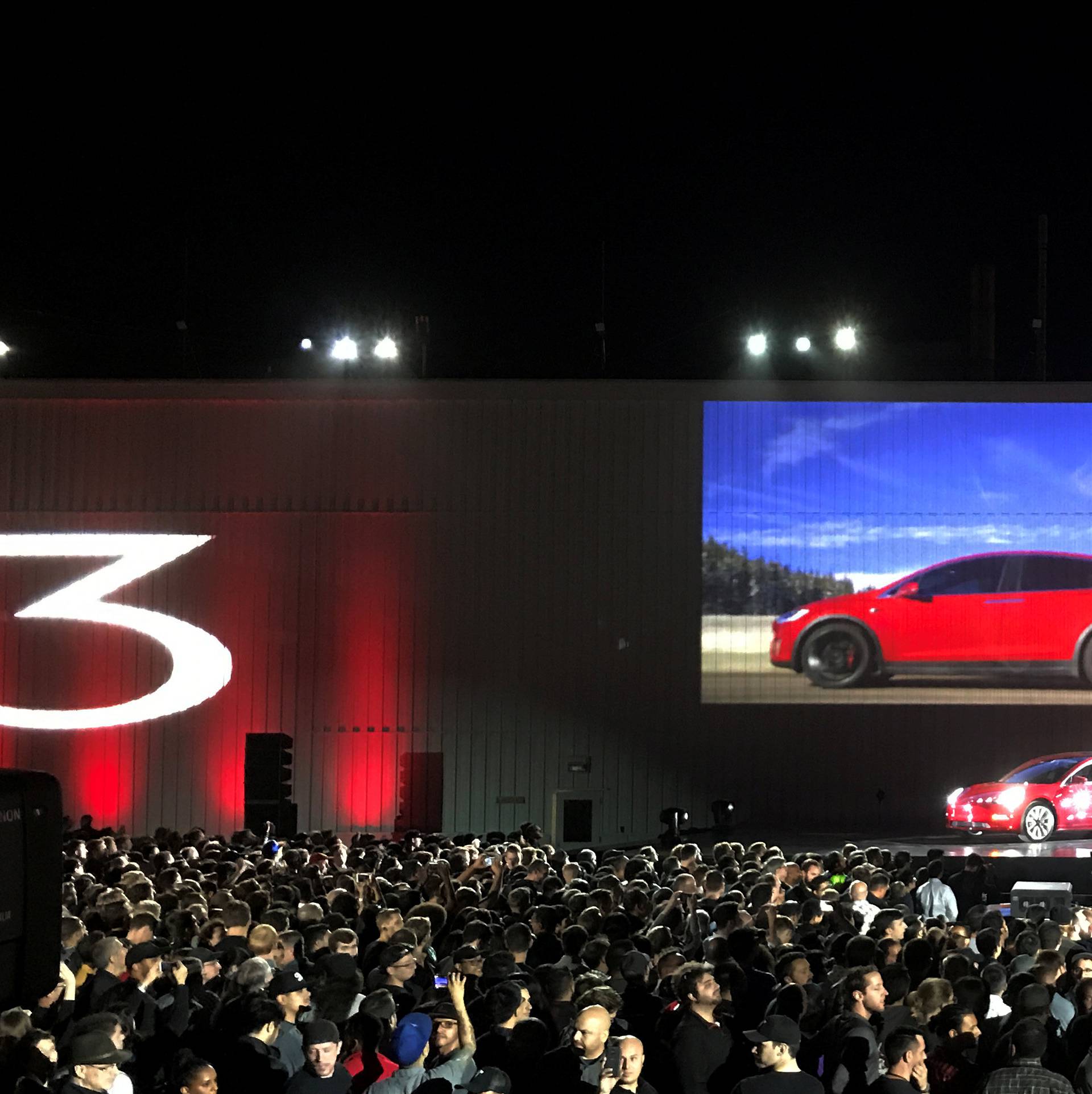 Tesla introduces one of the first Model 3 cars off the Fremont factory's production line during an event at the company's facilities in Fremont,