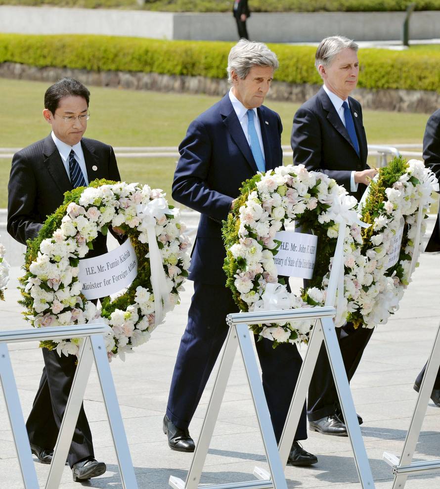 U.S. Secretary of State Kerry prepares to lay a wreath at the cenotaph with G7 FMs at Hiroshima Peace Memorial Park and Museum in Hiroshima