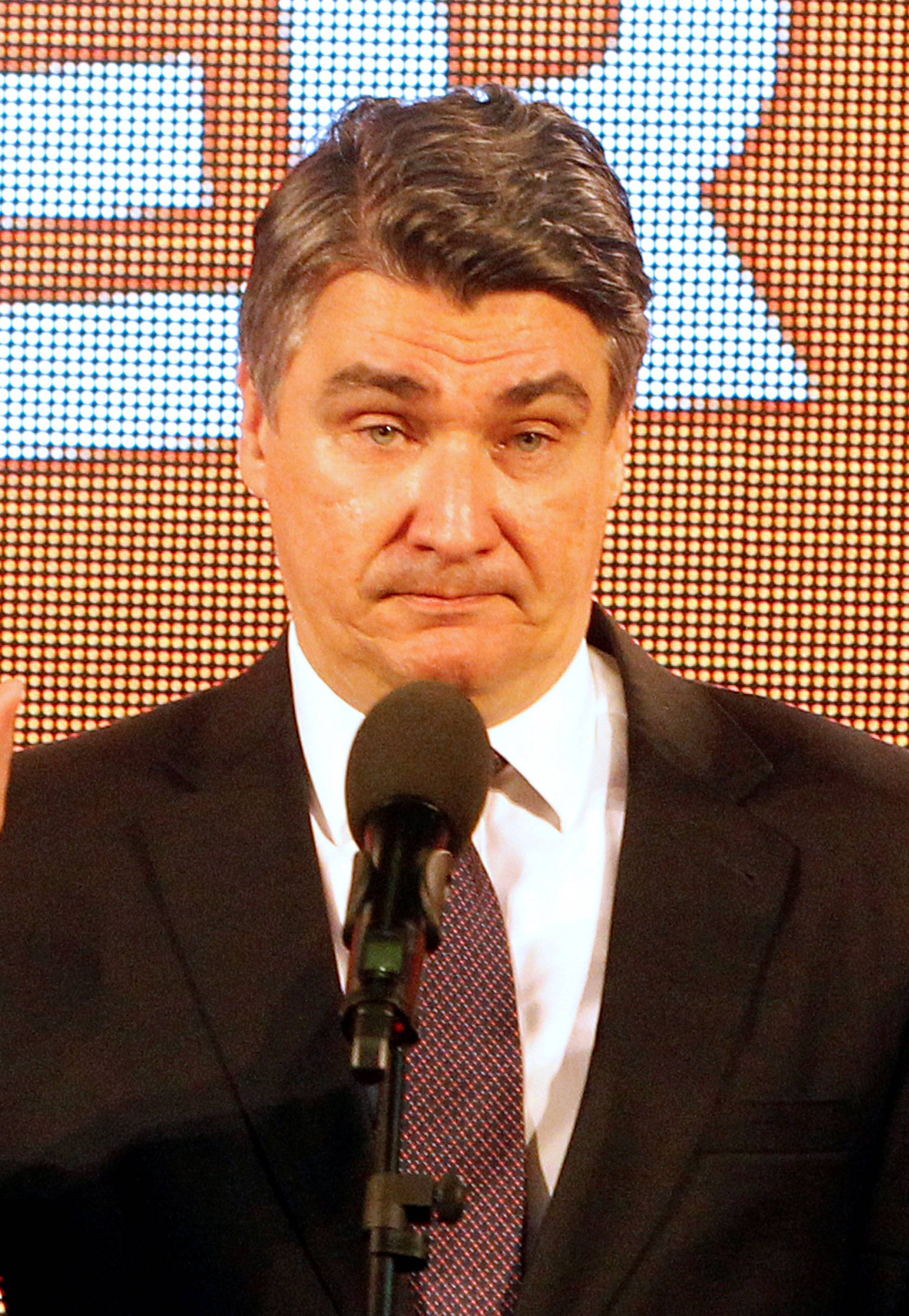 Zoran Milanovic, president of Social Democratic Party (SDP), reacts during a press conference after a parliamentary election in Zagreb