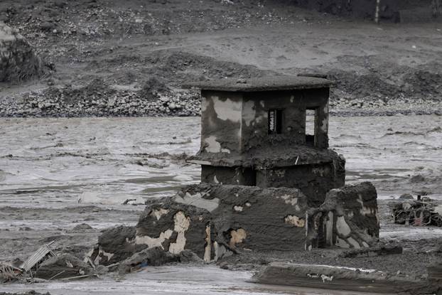 A mud-covered building following a flash flood at Trishuli, Nepal