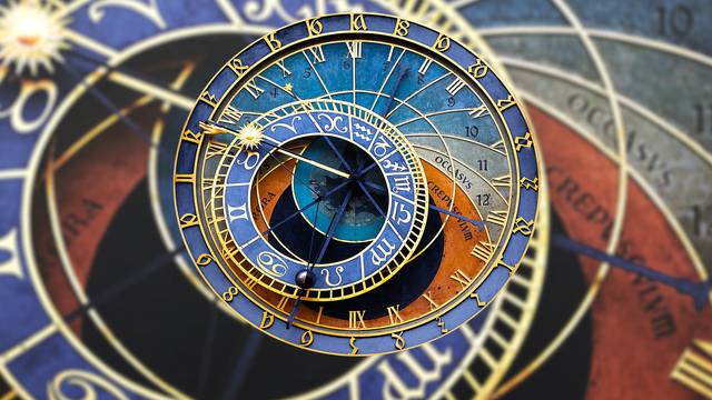 Old astronomical clock isolated on white. Prague astronomical clock at the Old Town City Hall from 1410 is the third oldest astronomical clock in the world