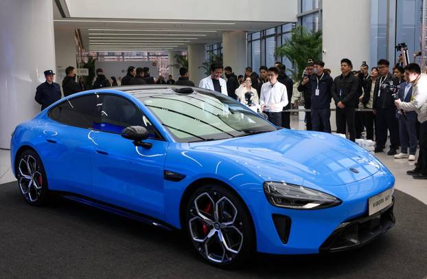 Chinese tech giant Xiaomi unveils new generation of SU7 electric vehicle, in Beijing