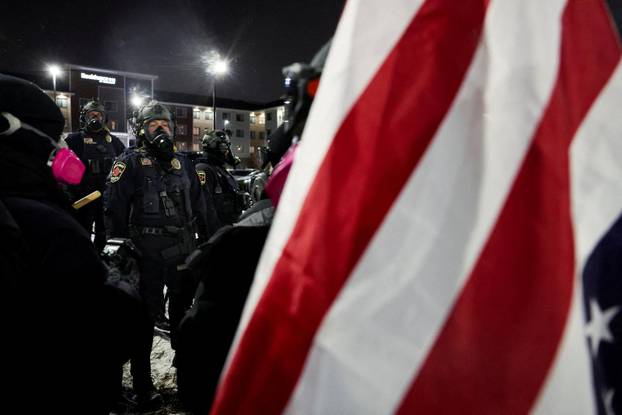 Protest outside the hotel where Bovino, who has been removed from his role, is reportedly staying, in Maple Grove