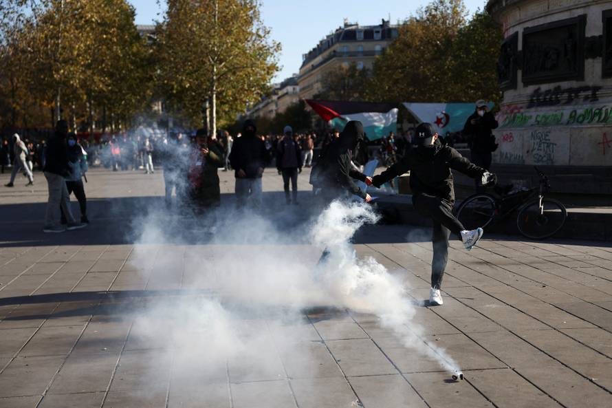 Demonstrators gather at the Place de la Republique, in Paris