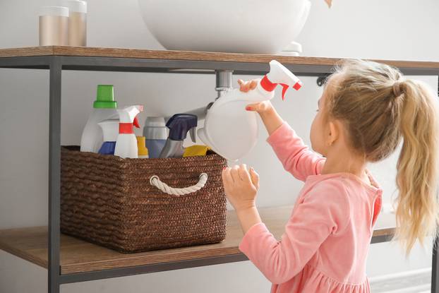 Little,Girl,Playing,With,Cleaning,Supplies,At,Home