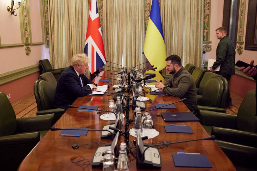 Ukraine's President Zelenskiy and British PM Johnson attend a meeting in Kyiv