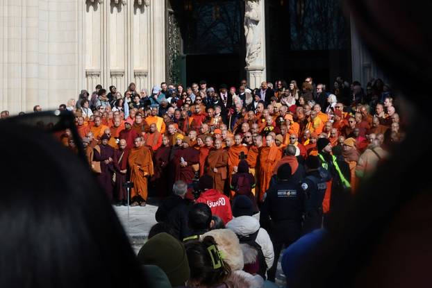 A group of Buddhist monks on the 2,300-mile "Walk for Peace" stand outside the National Cathedral in Washington