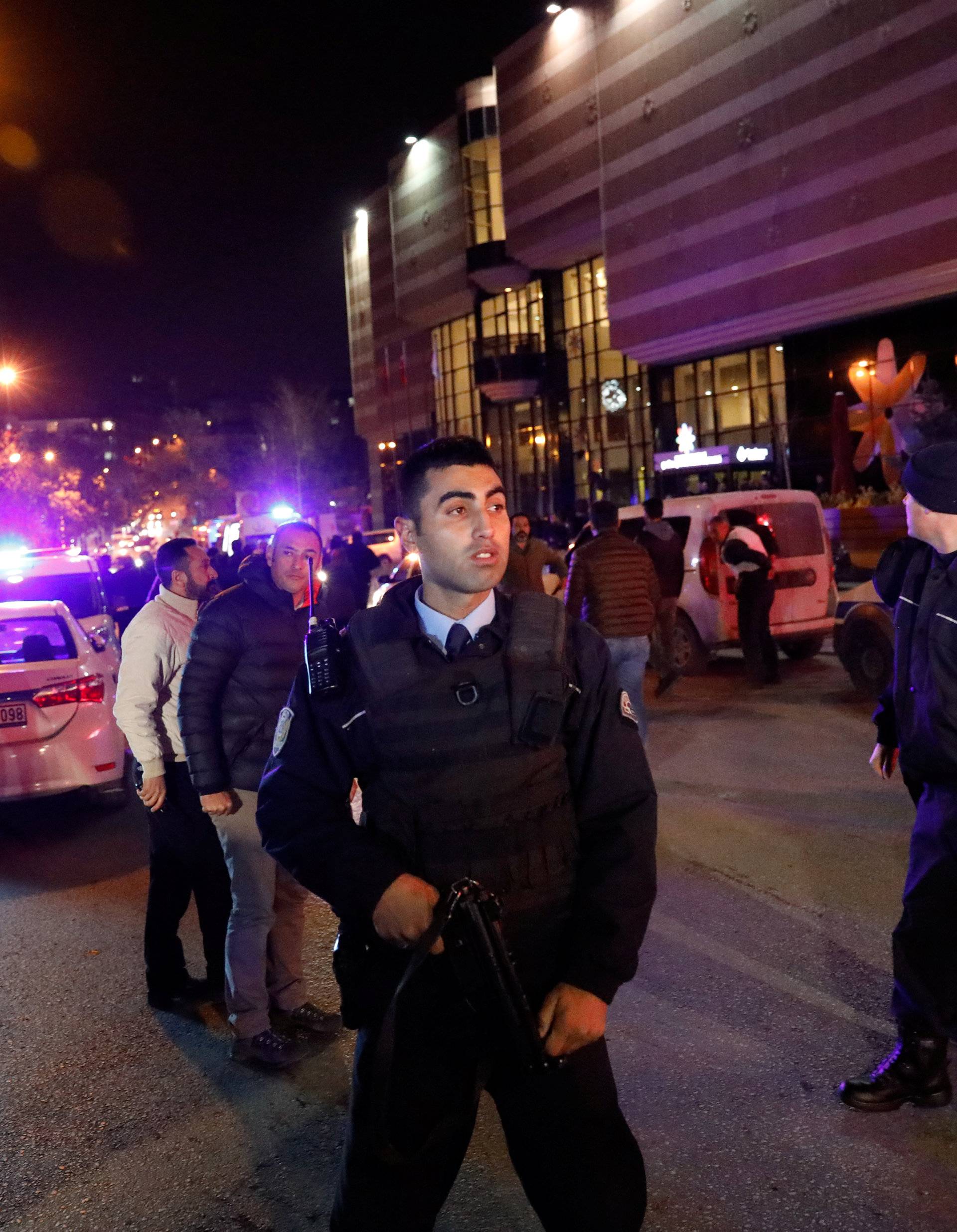 Turkish police secure the area near an art gallery where the Russian Ambassador to Turkey Andrei Karlov was shot in Ankara