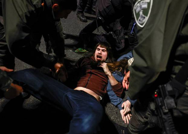 Israelis protest a ceasefire deal, in Jerusalem