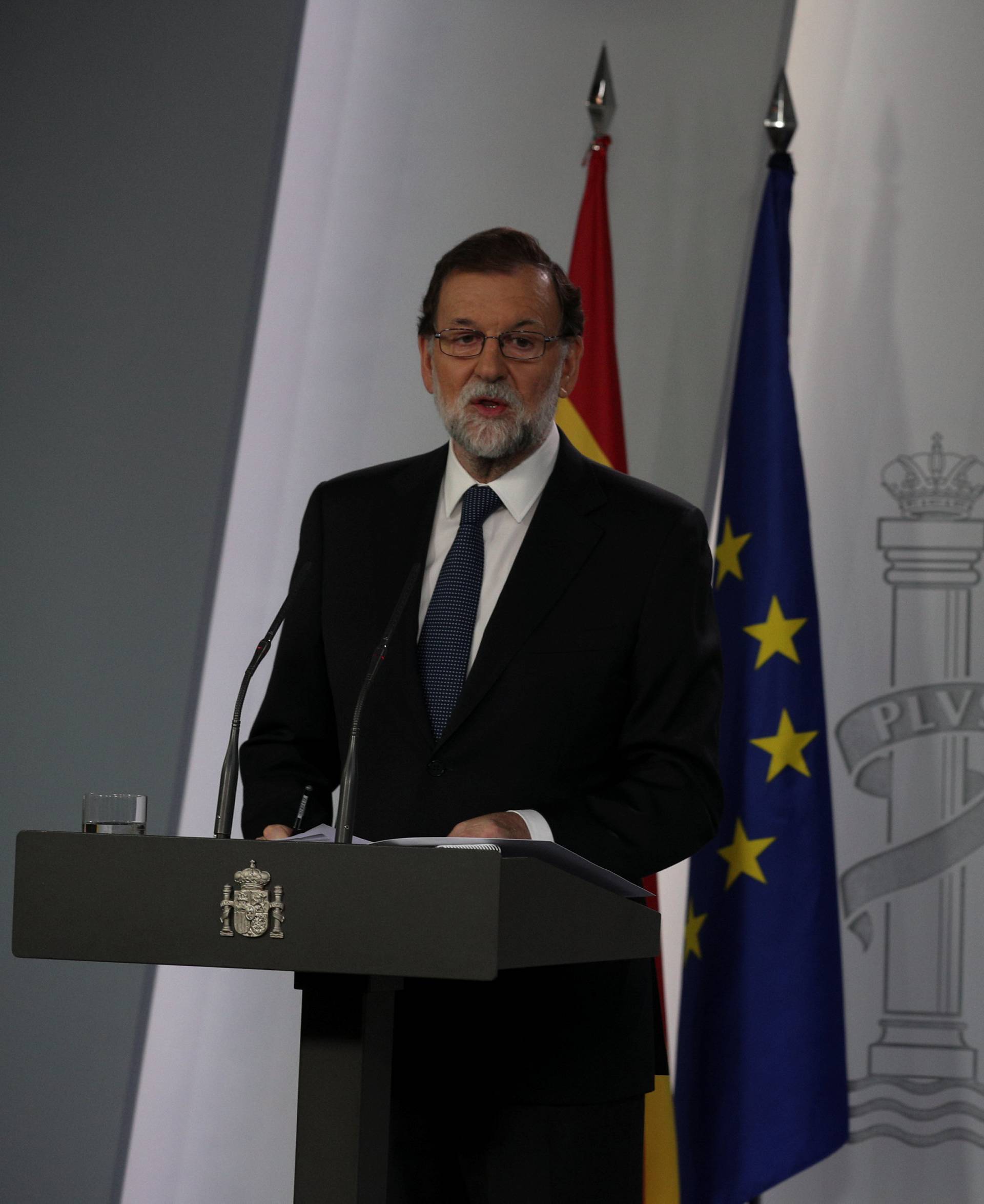 Spain's PM Rajoy delivers a statement at the Moncloa Palace in Madrid
