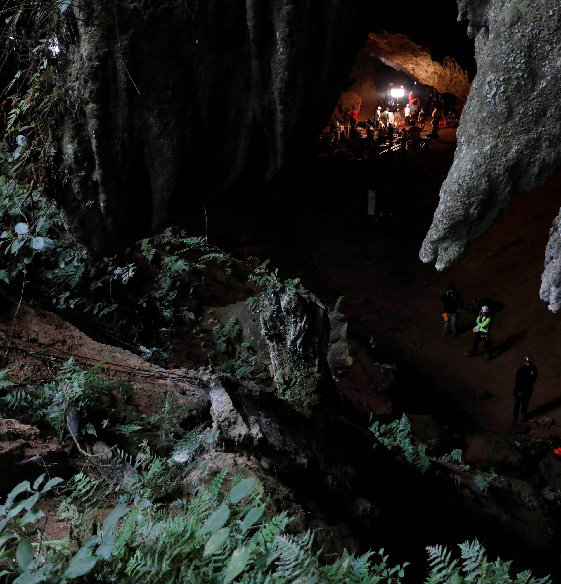 Rescue workers are seen in Tham Luang caves during a search for 12 members of an under-16 soccer team and their coach, in the northern province of Chiang Rai