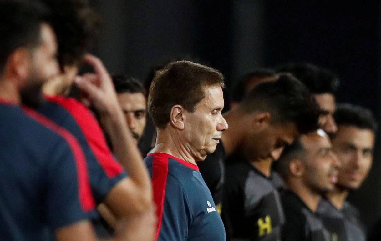 Ezzeldin Bahader, a 74-years-old Egyptian football player of 6th October Club looks on before a soccer match against El Ayat Sports Club of Egypt's third division league at the Olympic Stadium in the Cairo suburb of Maadi