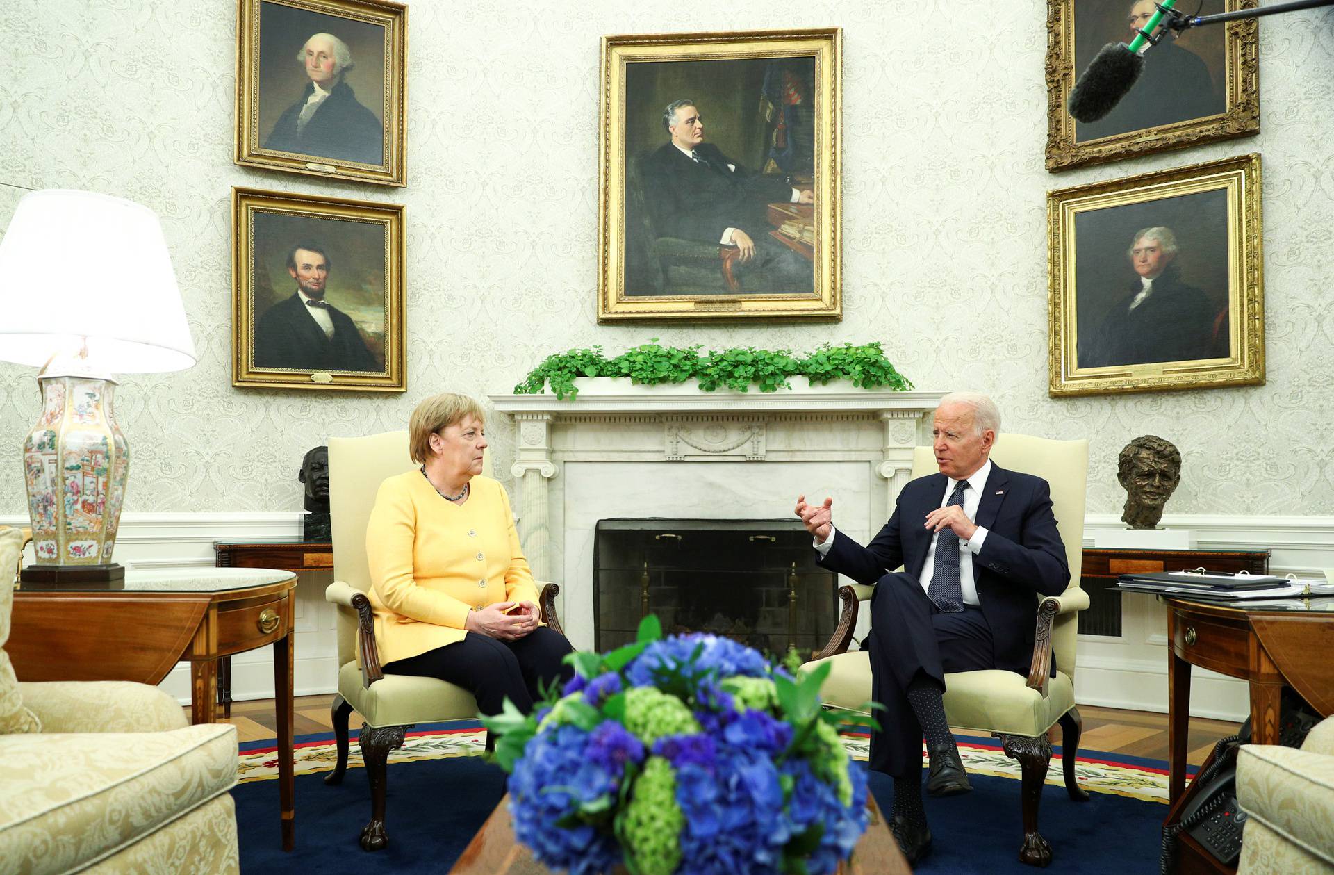 U.S. President Joe Biden holds a bilateral meeting with German Chancellor Angela Merkel in the Oval Office at the White House