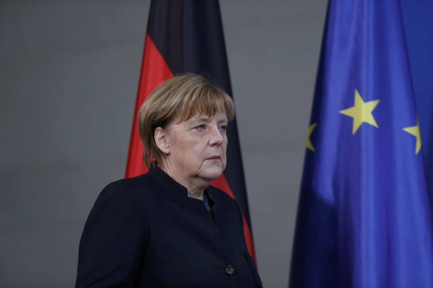 German Chancellor Angela Merkel arrives for a news conference in Berlin