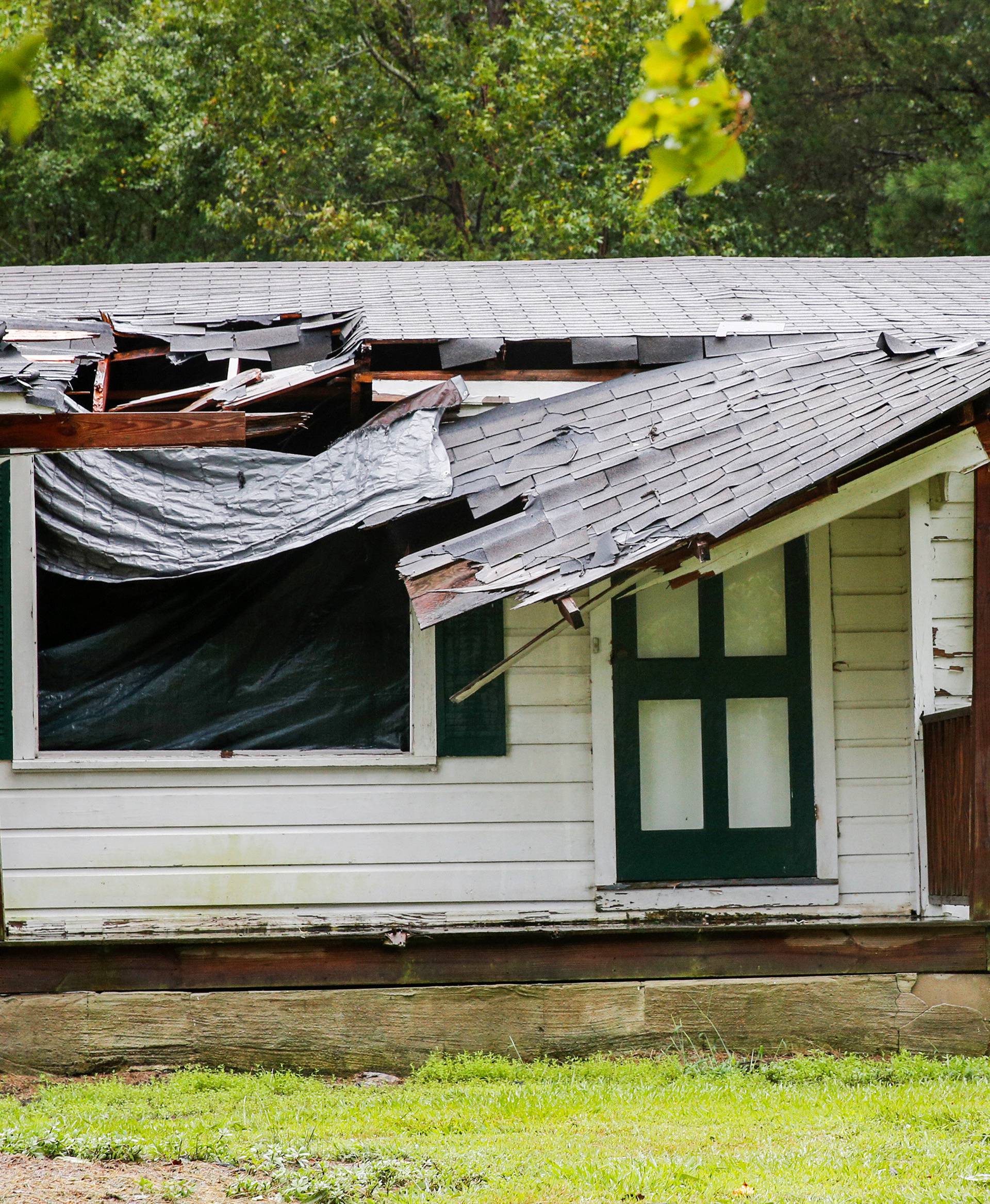 The roof of a house is seen affected by winds from Hurricane Florence as it hits the town of Wilson, North Carolina