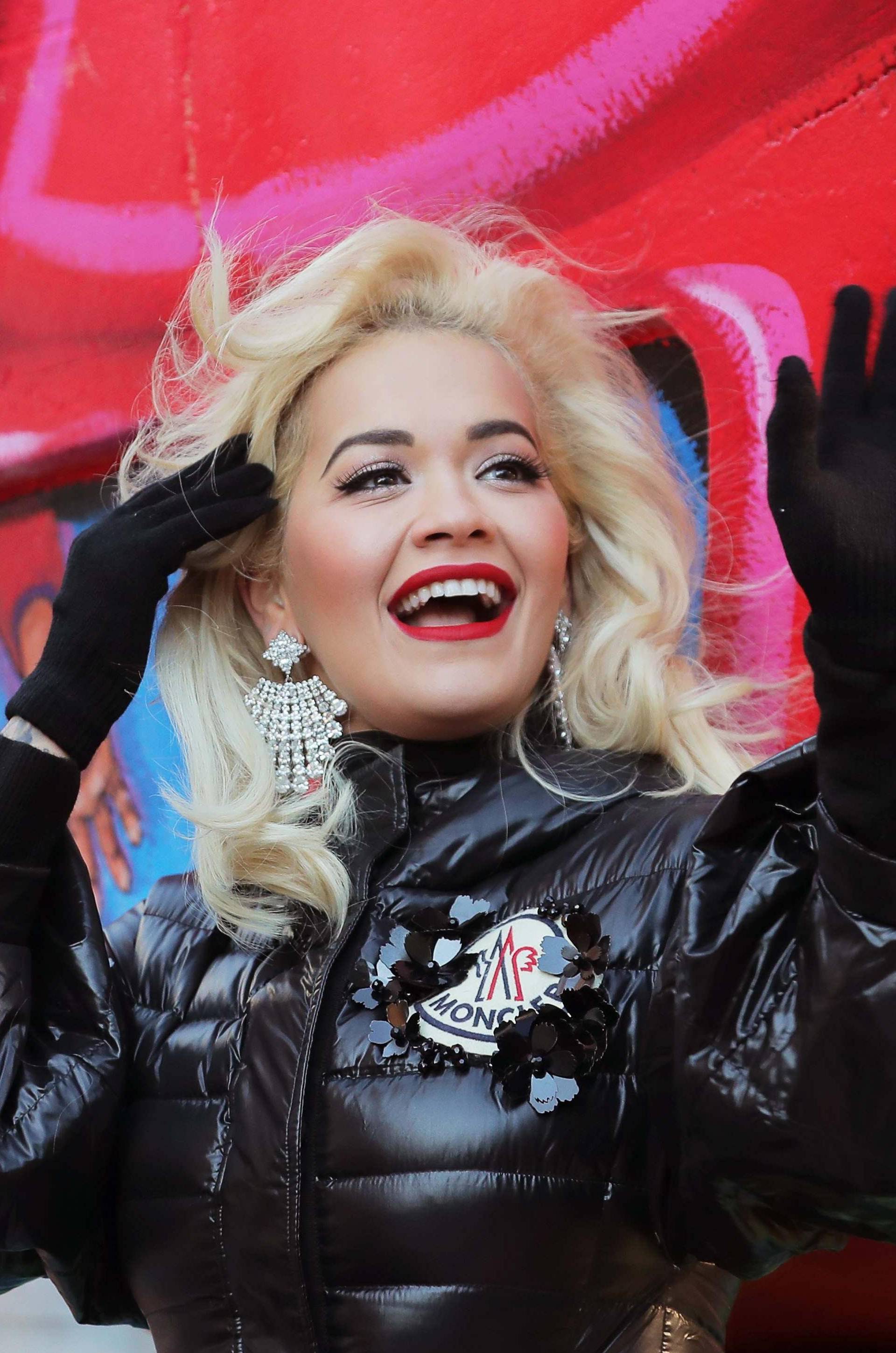 Singer Rita Ora waves to the crowd during the Macy's Thanksgiving Day Parade in Manhattan
