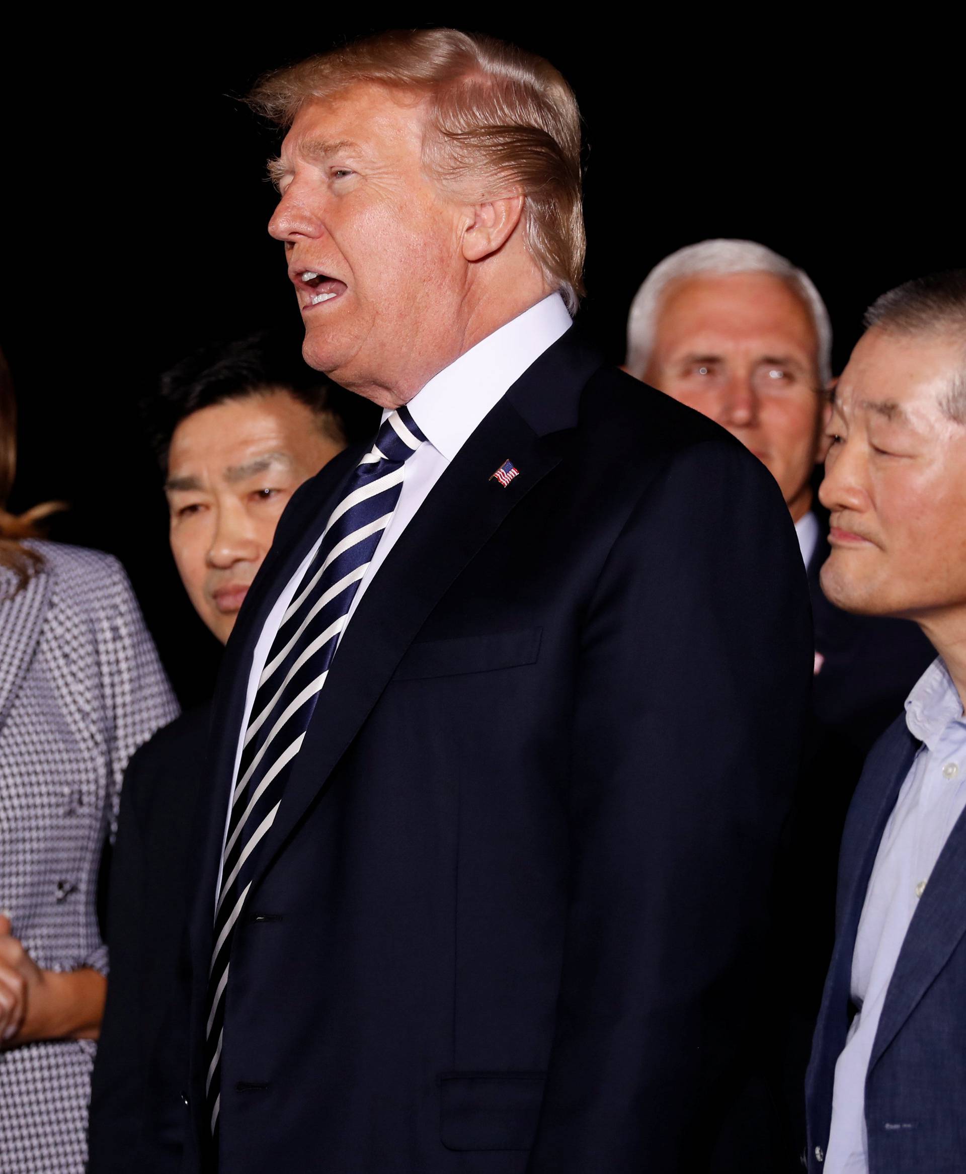 U.S.President Donald Trump speaks to the media as he meets the Americans released from detention in North Korea, upon their arrival at Joint Base Andrews