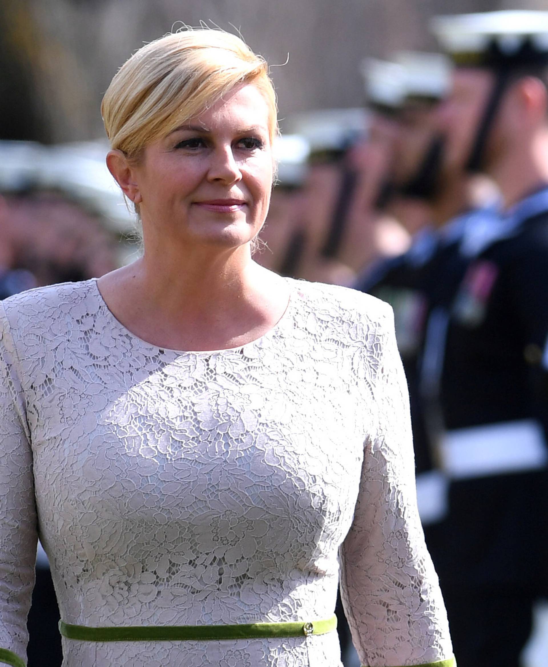 President of Croatia Kolinda Grabar-Kitarovic inspects an Australian military guard of honour during ceremonial welcome at Government House in Canberra