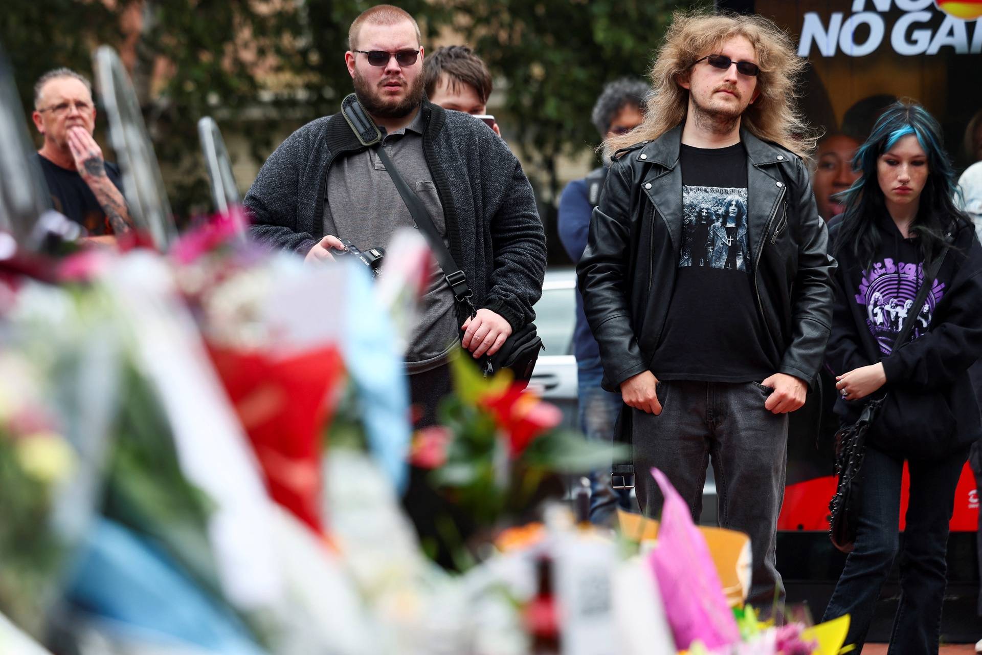 Fans pay tribute following the death of Ozzy Osbourne, in Birmingham