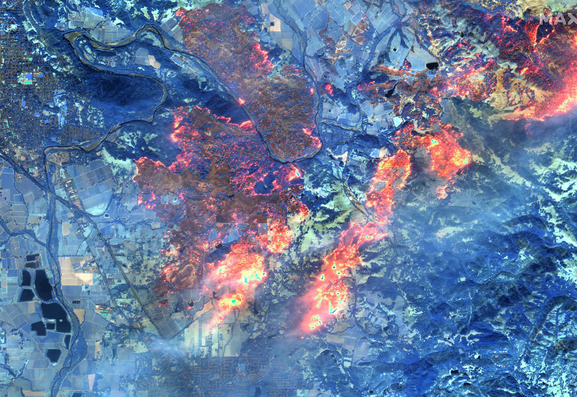 A shortwave infrared (SWIR) satellite image shows the Kincade fire near Healdsburg, California