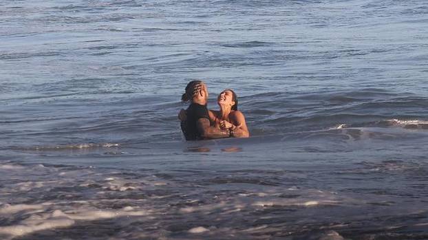 *PREMIUM-EXCLUSIVE* Kim Kardashian and Lewis Hamilton seal their relationship with a kiss as they spend a day surfing together in Malibu **WEB EMBARGO UNTIL 4 pm ET on April 22, 2026**