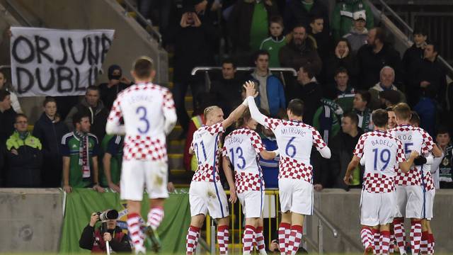 Croatia's Duje Cop celebrates scoring their second goal with teammates