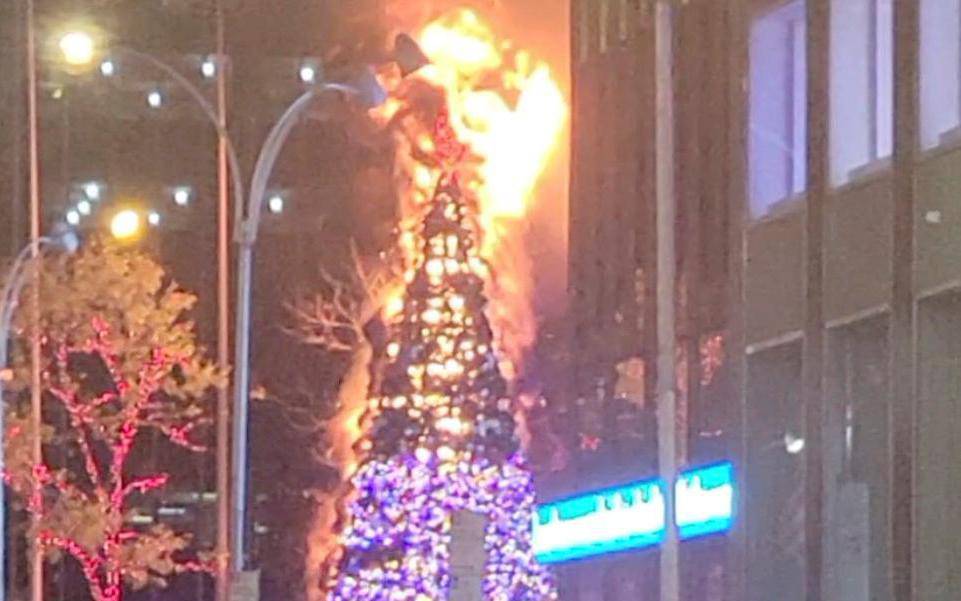 Christmas tree burns outside Fox News building in New York City