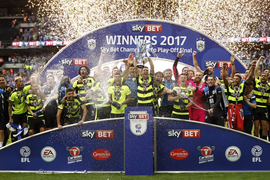 Huddersfield Town celebrate with the trophy after winning the Sky Bet Championship Play-Off Final and getting promoted to the Premier League