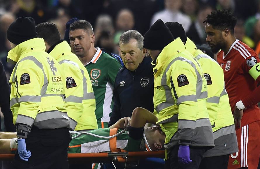 Republic of Ireland's Seamus Coleman is stretchered off injured