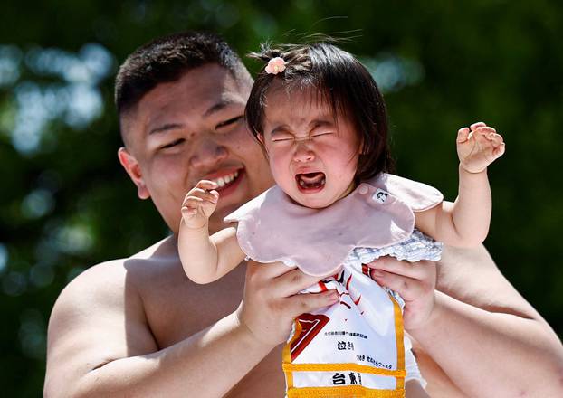 Babies take part in 'Nakizumo' or baby crying sumo contest at Sensoji temple in Tokyo