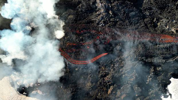 Italy's Mount Etna erupts