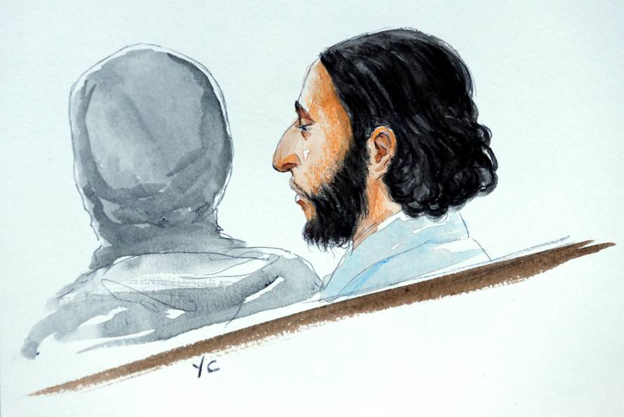 A court artist drawing shows Salah Abdeslam, one of the suspects in the 2015 Islamic State attacks in Paris, in court during his trial in Brussels