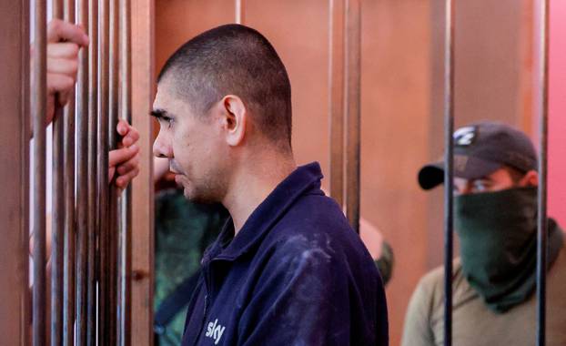 Foreign nationals captured during Ukraine-Russia conflict attend a court hearing in Donetsk