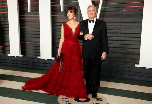 FILE PHOTO: Les Moonves and his wife, Julie Chen, arrive at the Vanity Fair Oscar Party in Beverly Hills