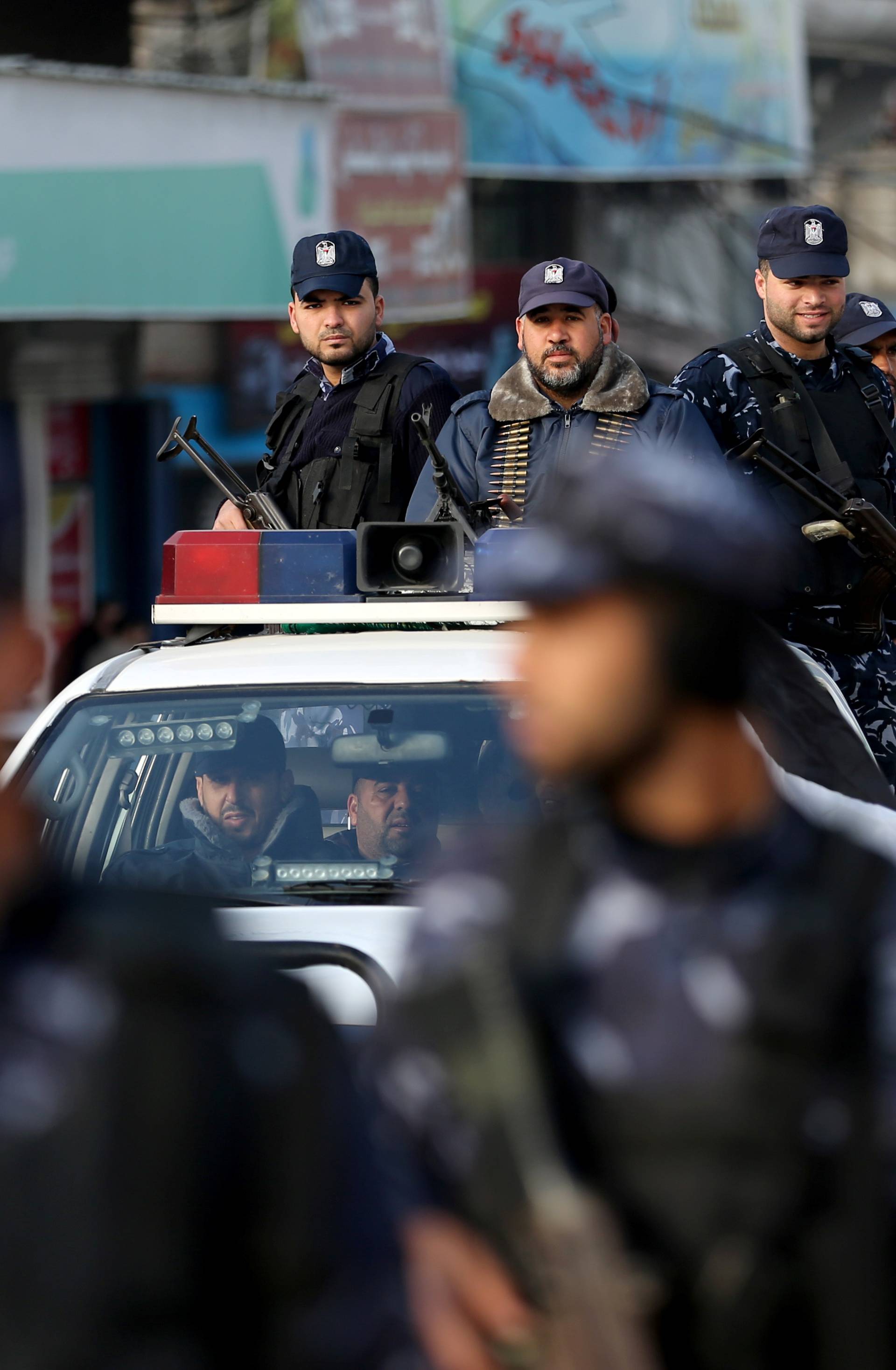 Palestinian policemen loyal to Hamas participate in a march as they protest against the U.S. Middle East peace plan, in Khan Younis in the southern Gaza Strip