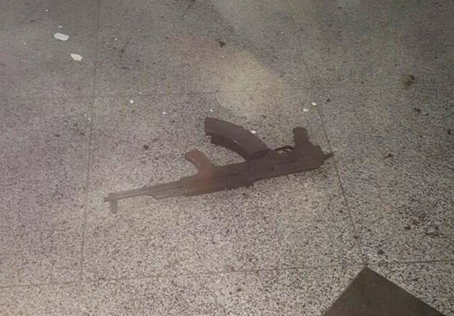 A weapon is seen on the floor at Ataturk airport after suicide bombers opened fire before blowing themselves up at the entrance, in Istanbul, Turkey