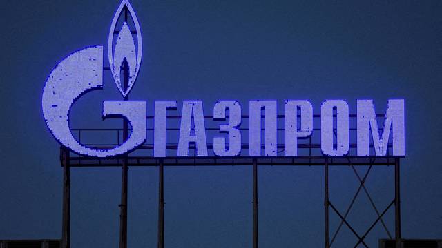 FILE PHOTO: FILE PHOTO: A Gazprom sign is seen on the facade of a business centre in Saint Petersburg