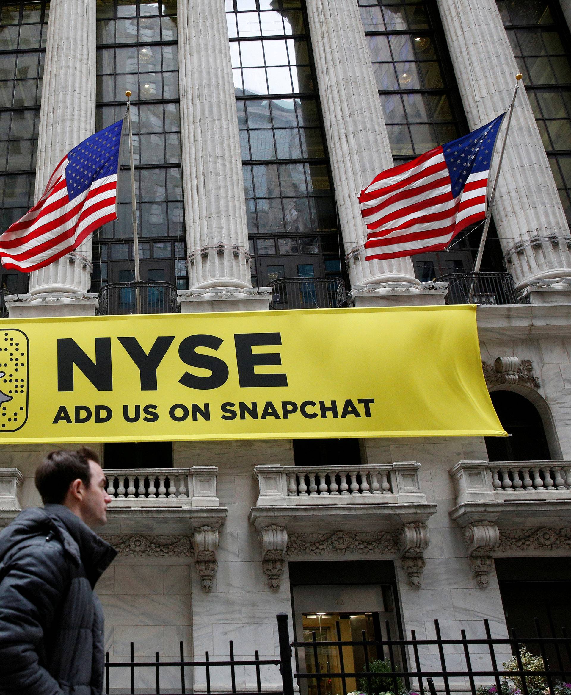 FILE PHOTO - A Snapchat sign hangs on the facade of the NYSE in New York City
