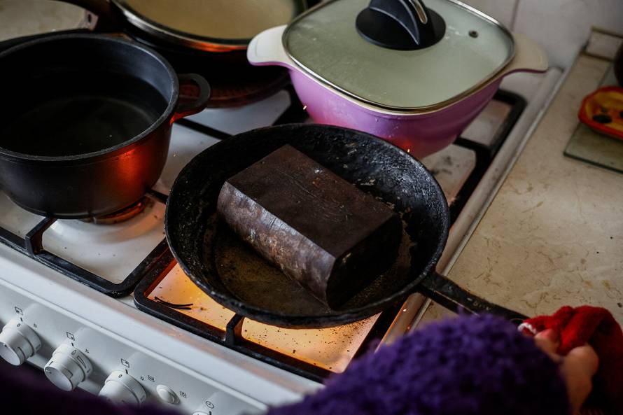 Kyiv residents cope with cold after heating loss as critical civil infrastructure was hit by recent Russian missile and drone strikes