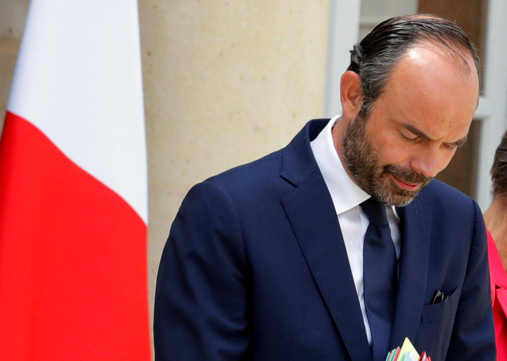 French Prime Minister Edouard Philippe leaves at the end of the weekly cabinet meeting at the Elysee Palace in Paris