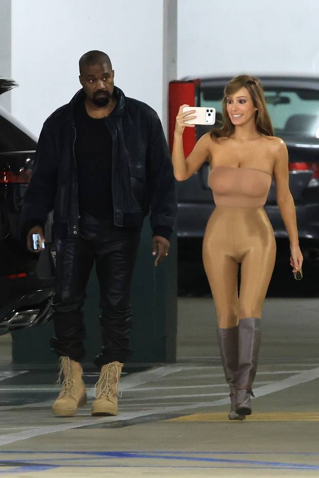 *EXCLUSIVE* Bianca Censori Stuns in a Bold Nude Look as Kanye West Keeps It Casual During LA Errands **WEB MUST CALL FOR PRICING**