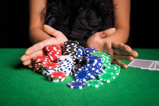 Woman,Playing,Poker,With,All,In