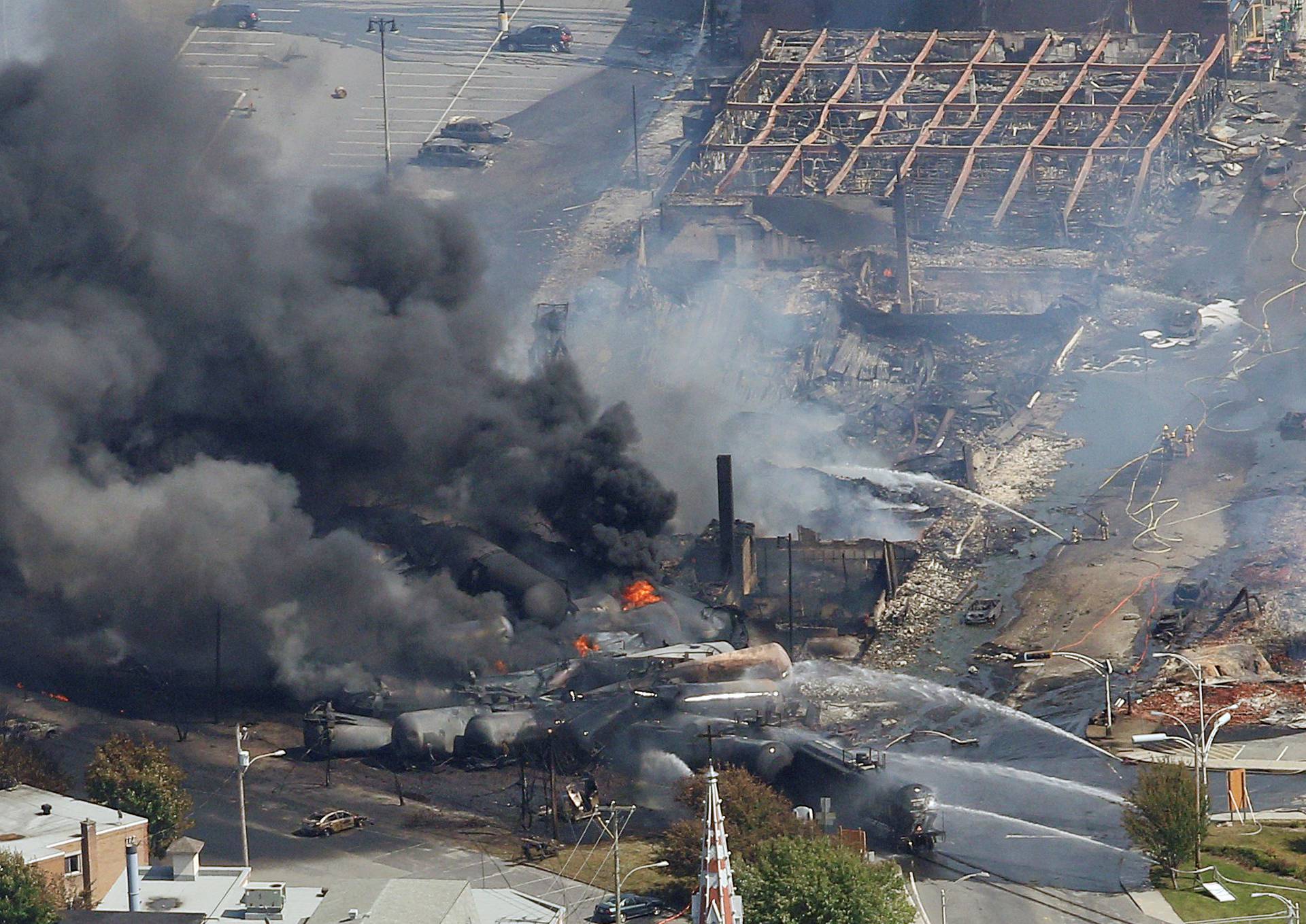 FILE PHOTO: First responders work on the site of a train wreck in Lac Megantic
