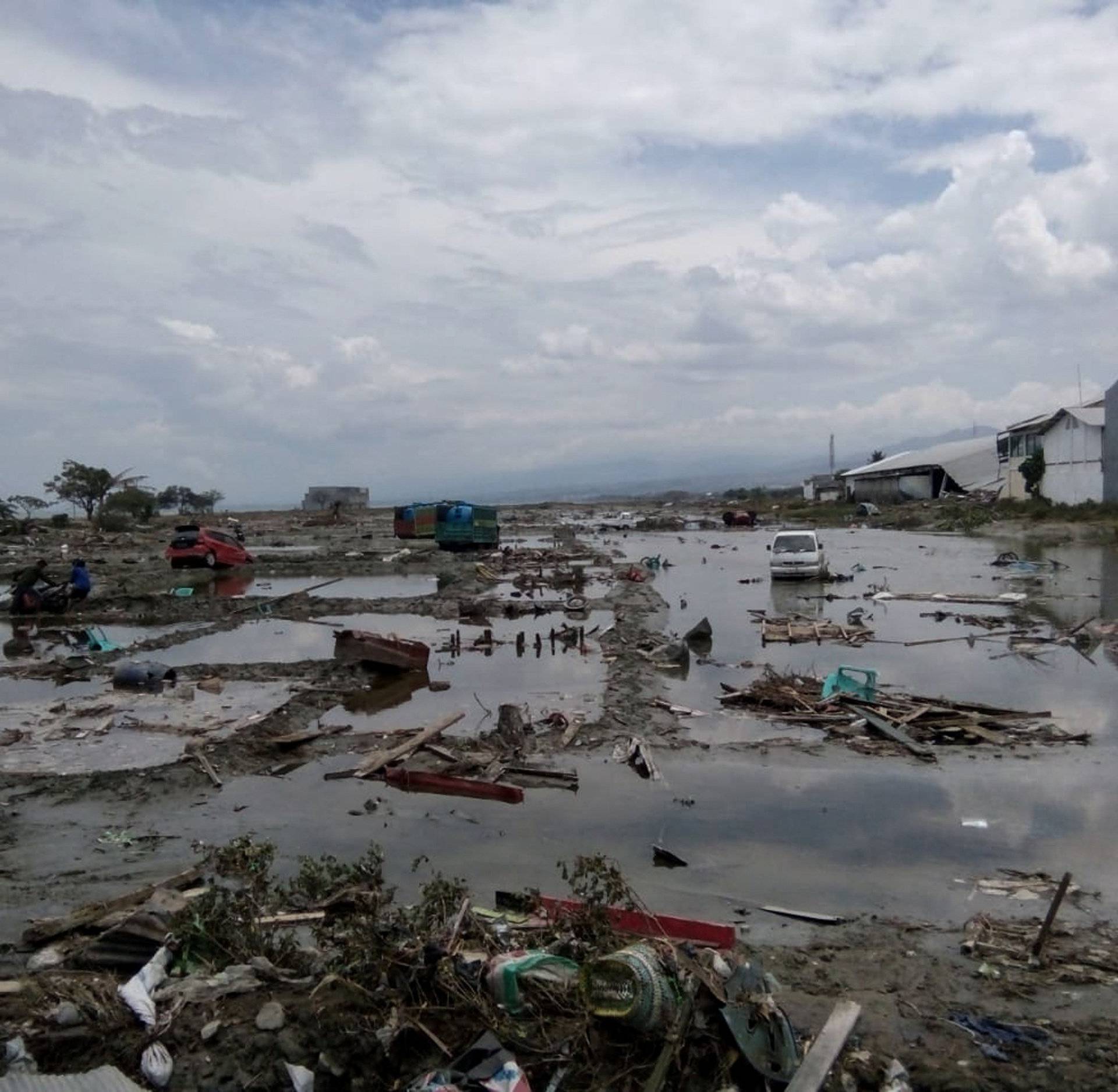 The ruins of cars as seen after tsunami hit in Palu