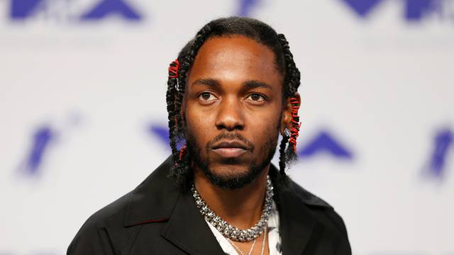 FILE PHOTO: Musician Kendrick Lamar arrives at the 2017 MTV Video Music Awards in Inglewood