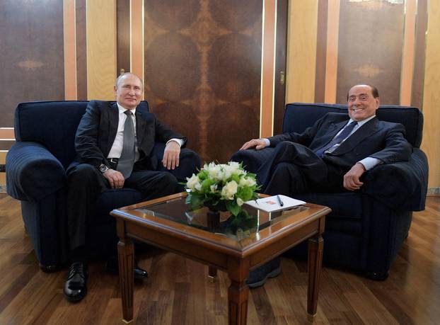 FILE PHOTO: Russian President Putin meets with Italian Member of the European Parliament Berlusconi in Rome